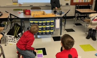 East Forest Elementary Students Program Code-Driven Cars  