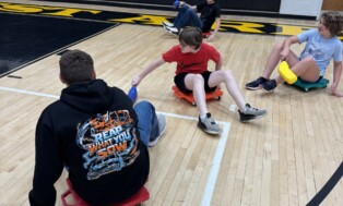 West Forest PE Classes Play Scooter Hockey~