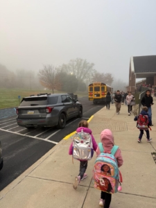 Kids getting on school bus